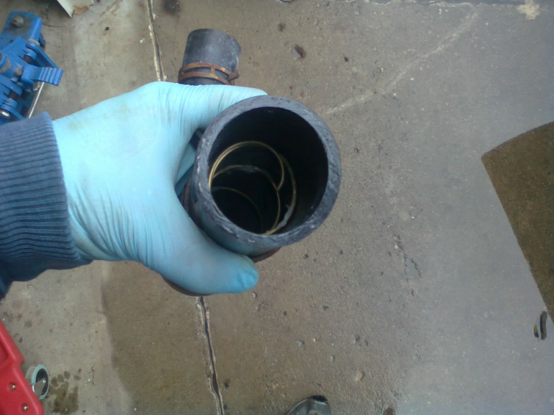 Don’t forget to transfer the spring! (That goop you see is petroleum jelly, to lubricate the hose for easy installation. I think I used a little too much.)